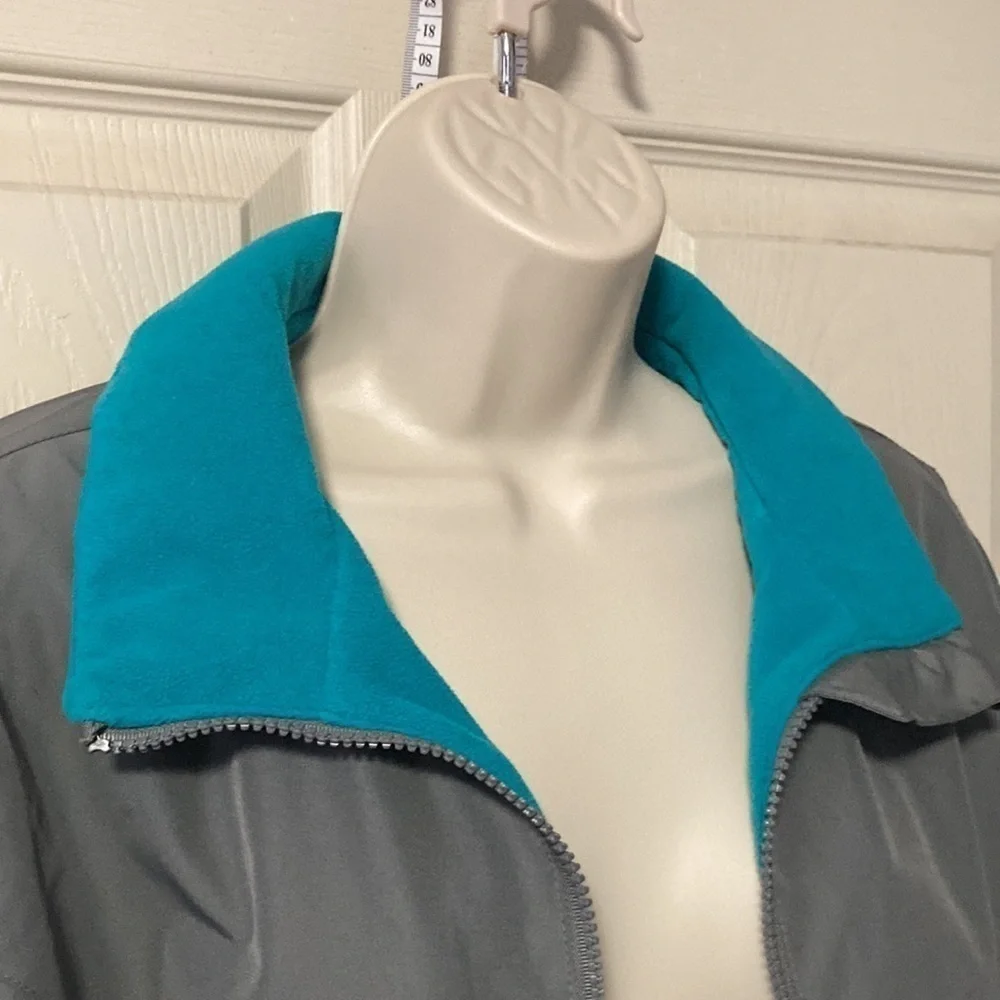 Magellan outdoor jacket grey with teal fleece lining size M